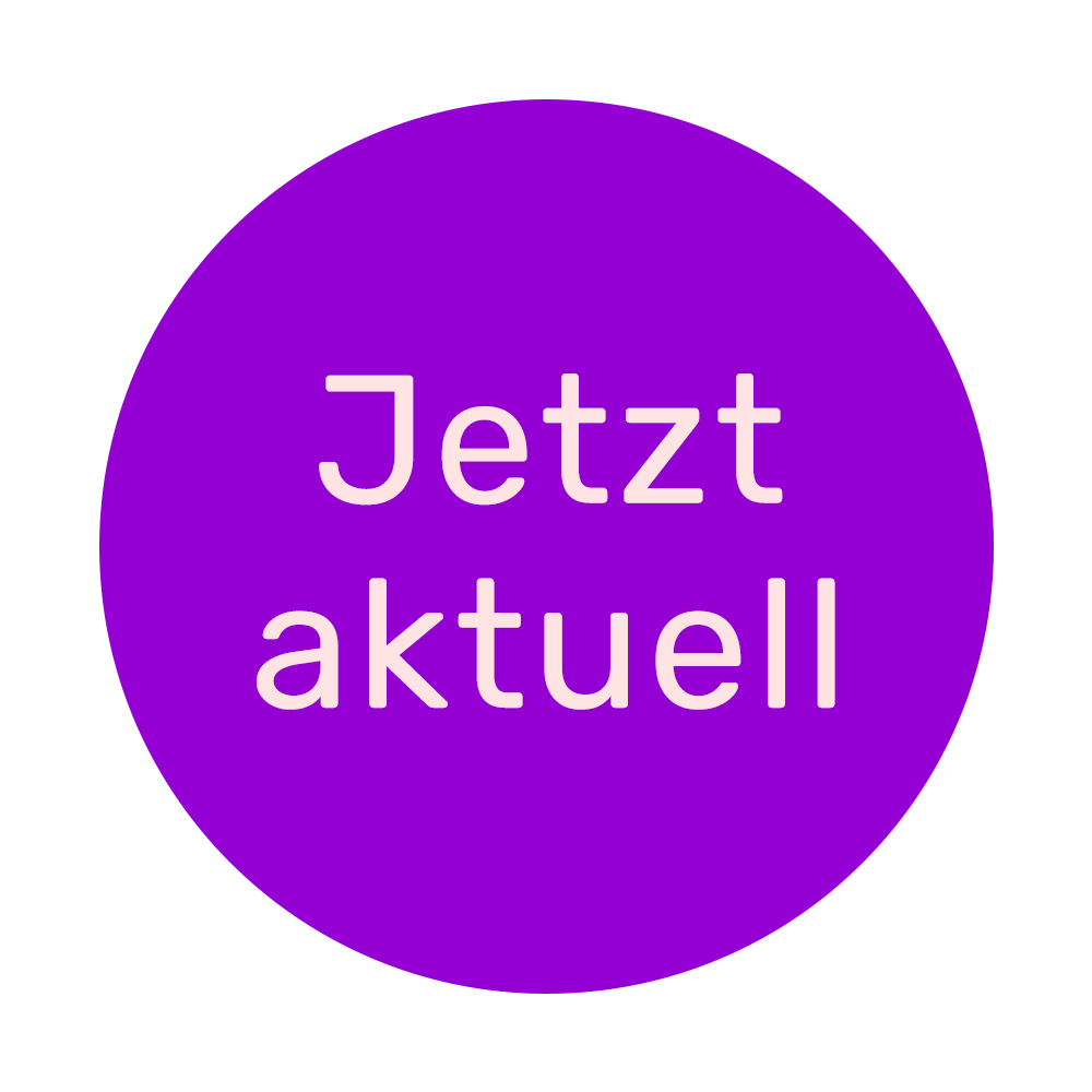 Violetter Kreis mit der Aufschrift JETZT NEU